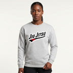 Grey Jiu Jitsu crewneck sweatshirt worn by female in front view with chest artwork.