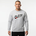 Grey Jiu Jitsu crewneck sweatshirt worn by male in front view with chest artwork.