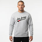 Grey Jiu Jitsu crewneck sweatshirt worn by male in front view with chest artwork.