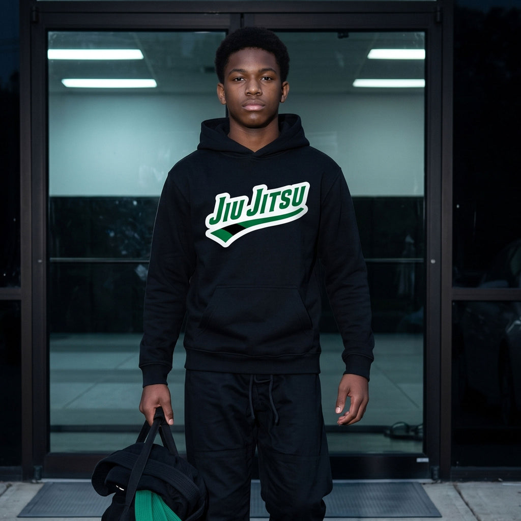 Green belt Jiu Jitsu hoodie worn with gym bag and matching green belt.
